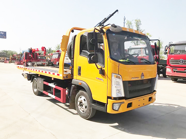 國(guó)六藍(lán)牌重汽豪沃一拖二清障車